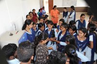 Students discussing with Deepthi Hebbale