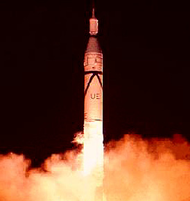 The launch of Explorer 1 (small long object at very top) aboard a Redstone-Jupiter C rocket.