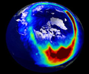 The aurora borealis activated by a solar storm; this visible image was made on July 15, 2000 by the Polar satellite; note the arctic islands and landmasses.