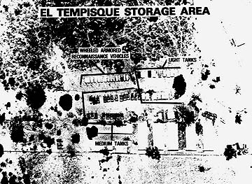 Tanks and armored vehicles in this image (possibly thermal IR) of a facility in Nicauragua.