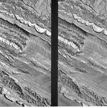 Stereo image pair for a terrain in which sedimentary rock units are inclined (dipping).