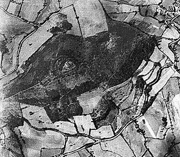 1944 aerial photo of Mt. Dardon hillfort with ancient Celtic ramparts visible around the top of the mountain.