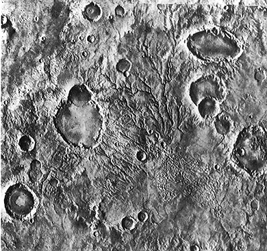  Craters, possibly with multiple origins, and channels in the southern Highlands of Mars; Viking Orbiter.