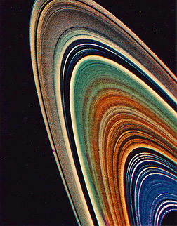Color-enhanced detailed image of the rings of Saturn.