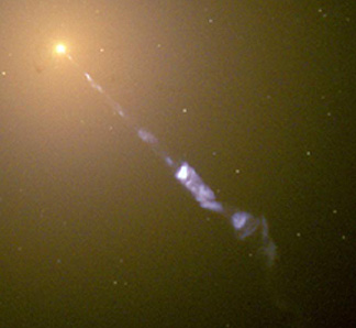 Jet of high speed luminous particles from a central Black Hole in the M87 galaxy.