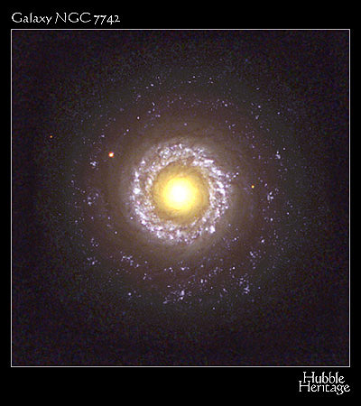 HST image of galaxy NGC7742, with an intense broad central region of high luminosity which may be caused by emissions as matter is drawn into a Black Hole.