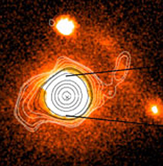 Quasar qso 1 Zw 1, imaged in the infrared by the HST; radio contours based on data obtained by the Plateau de Bure radio telescope in the High Alps.